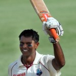 West Indies batsman Shivnarine Chanderpaul celebrates after making his century on day three of the second test against South Africa at the Warner Park ground in the St Kitts capital of Basseterre on June 20, 2010. South Africa failed to make early inroads into West Indies' batting, after AB de Villiers and Jacques Kallis gathered resolute hundreds to fortify their position in the second Test. The South Africans were hoping for a bag of early wickets, but West Indies captain Chris Gayle and fellow left-hander Narsingh Deonarine defied the Proteas' attack, as the home team reached 86 for one when bad light stopped play early on the second day at Warner Park. AFP PHOTO/Mark RALSTON (Photo credit should read MARK RALSTON/AFP/Getty Images)