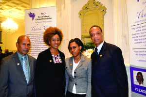 From left, TCCF President Jay Brijpaul, Julius Williams and daughter Jalissa Williams - a TCCF angel - and Fitzroy Gordon. Gerald V. Paul photo.
