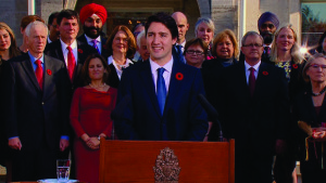 Prime Minister Justin Trudeau speaks outside Rideau Hall with his new cabinet. CBC photo.