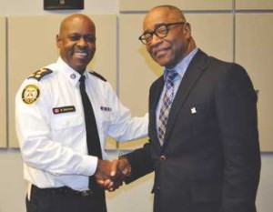 Chief Mark Saunders welcomes Ken Jeffers to the Toronto Police Services Board. Gerald V. Paul photo.