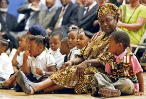 September 7, 2009-AFRICENTRIC SCHOOL-Shyheim Laryea (right) is joined by teacher/librarian Veronica Sullivan during Tuesday's opening assembly at Canada's first Africentric Public School in Toronto. September 8, 2009 marks the first day of classes at the alternative school that was opened in Sheppard Public School on Sheppard Ave. just west of Keele St. Tara Walton/Toronto Star
