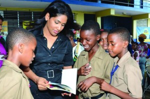 Lisa Hanna with some of the Jamaican youth who are her focus. By Claudette de la Haye Caribbean Financial Network News