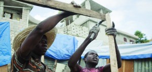 Workers help to restore earthquake damage in Haiti, which is also suffering a major drought.