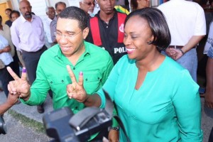 JLP Leader Andrew Holness and wife Juliette celebrate his victory.