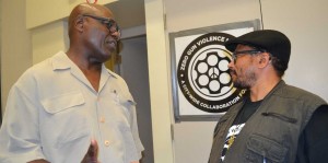 Former deputy chief Forde and Louis March discuss gun violence in Toronto. Gerald V. Paul photo.