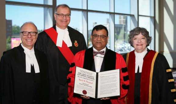 Former Guyanese refugee receives honorary doctor of laws degree
