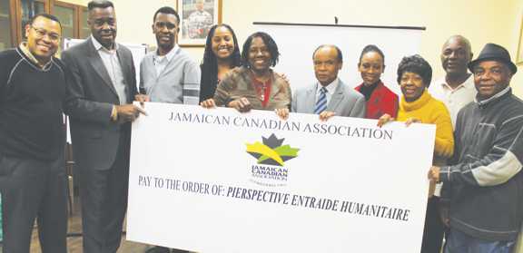 A BIG CHECK FOR HAITI