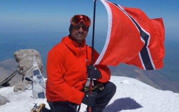 Trinidadian raises flag on highest mountain in Europe