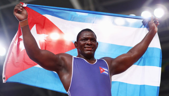Cuban Mijain Lopez wins fourth straight gold in wrestling