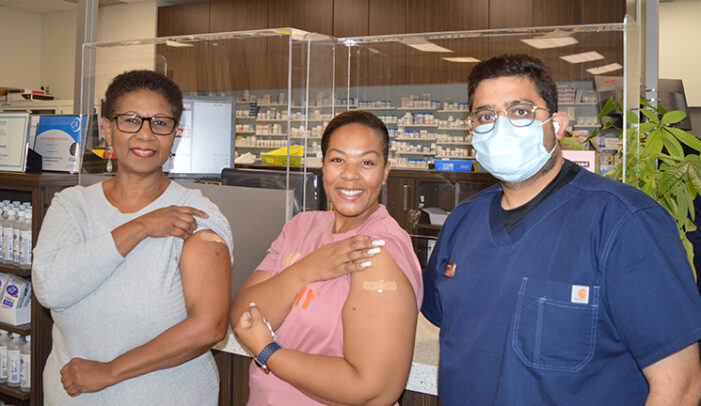 Associate Minister Charmaine Williams and family set example by taking flu shot