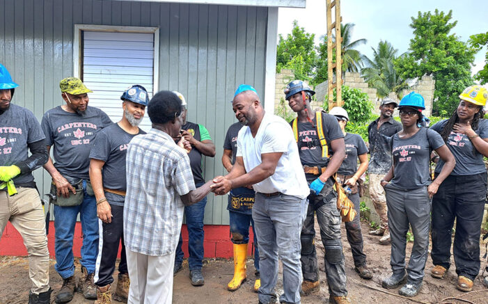 Members of the Carpenters Union build home for family in Jamaica in two days